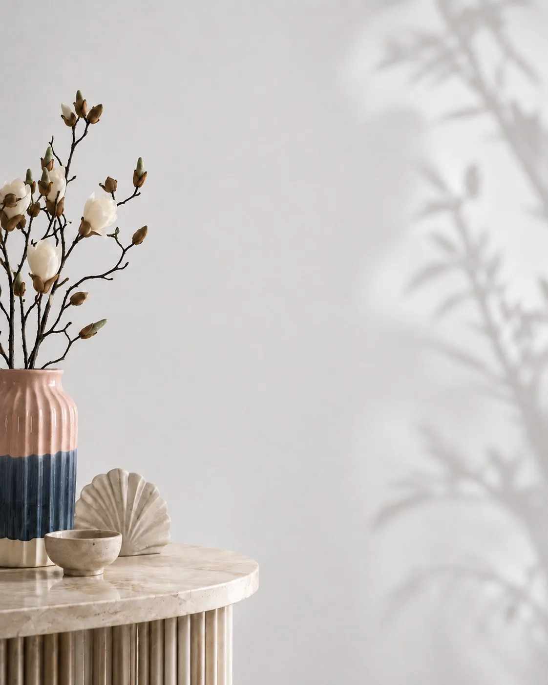 A still-life of flowers and decor in the Essência Skin treatment room